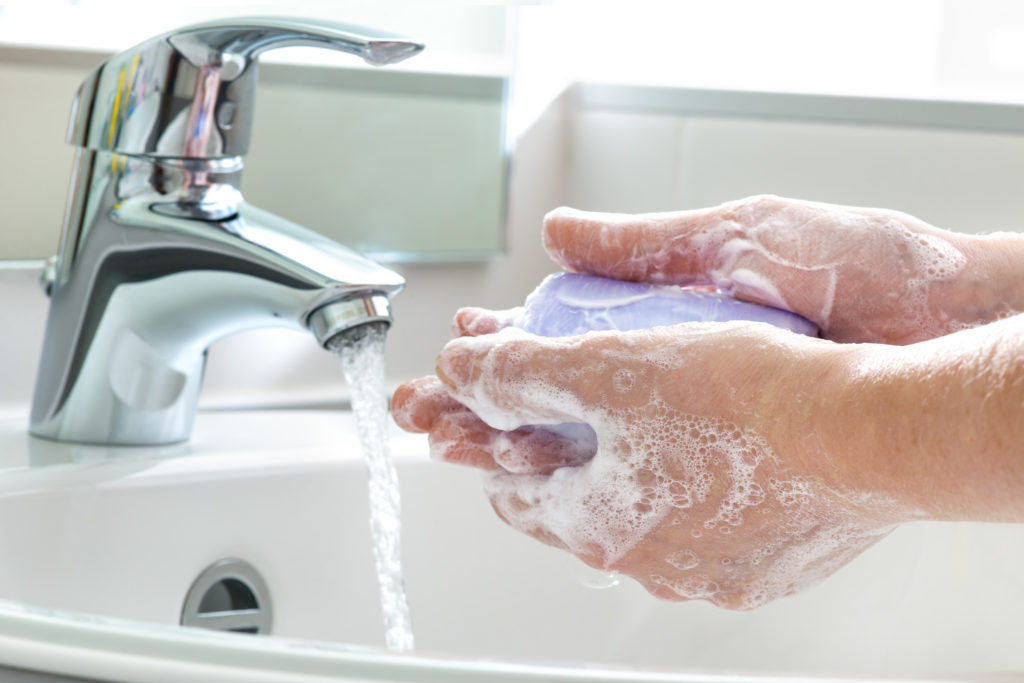 hands washing with soap and water