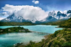 Beautiful mountain scene over a turquoise lake at Torres Del Paine National Park in Chile