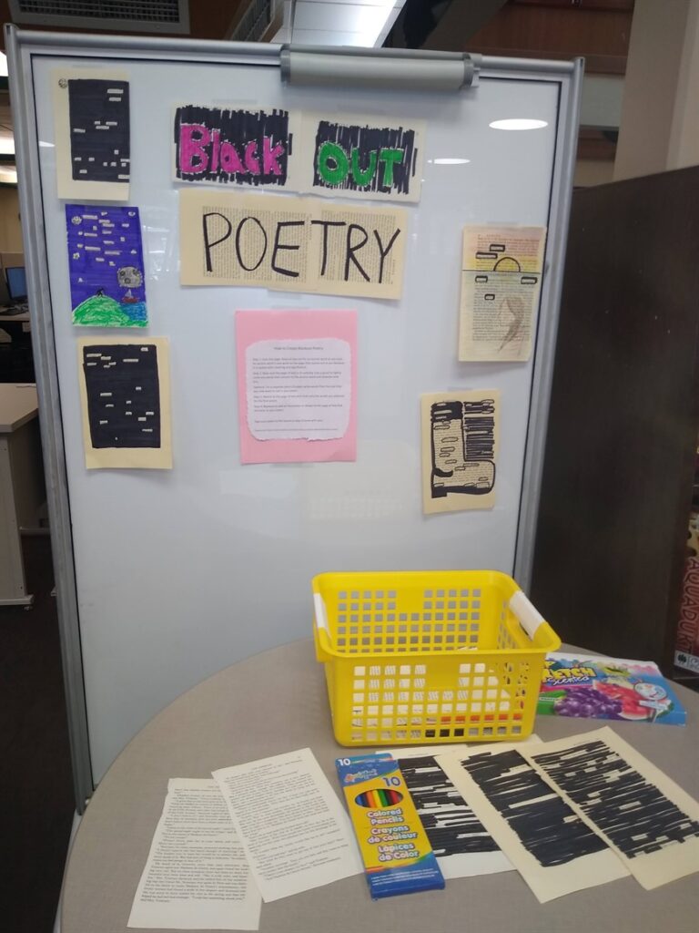 This is an image of a whiteboard, with the works Black Out Poetry in bright letters with different examples of poetry attached.